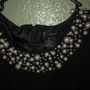 Pearl studded dress.